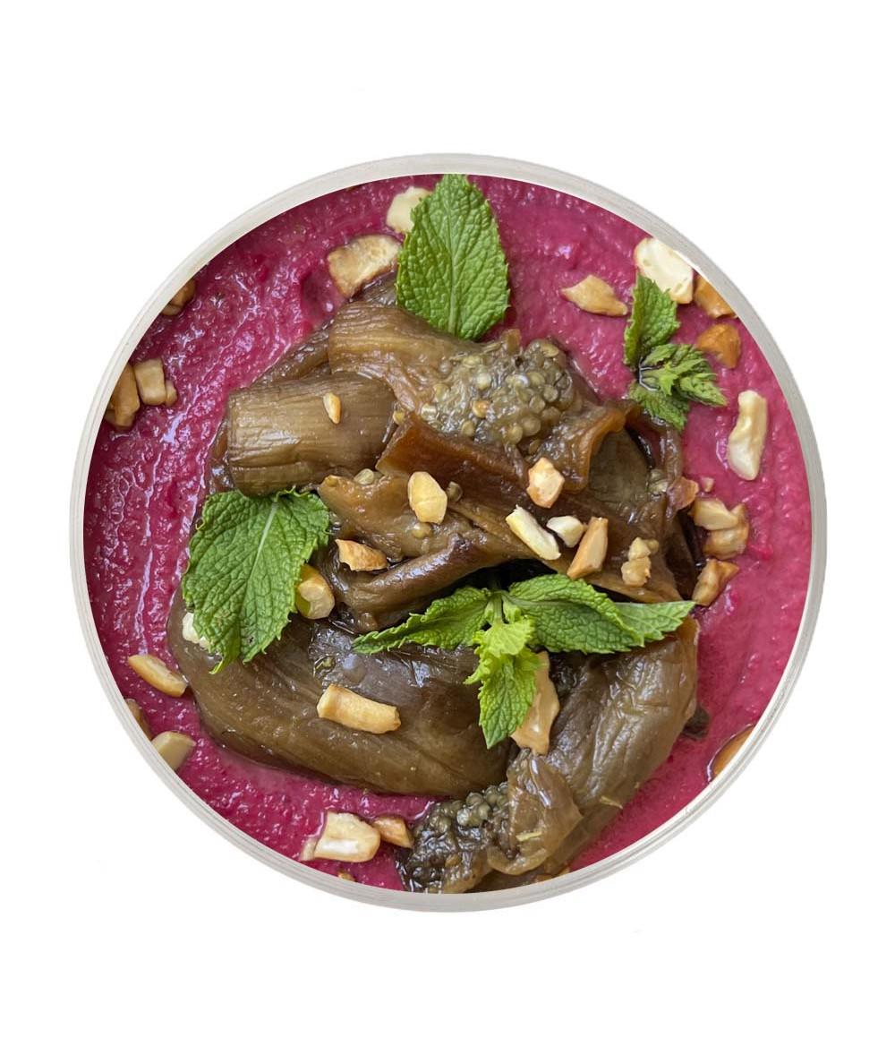 Marinated eggplants on beet hummus