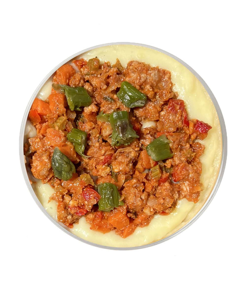 Garden-style sausage ragu with mashed potatoes