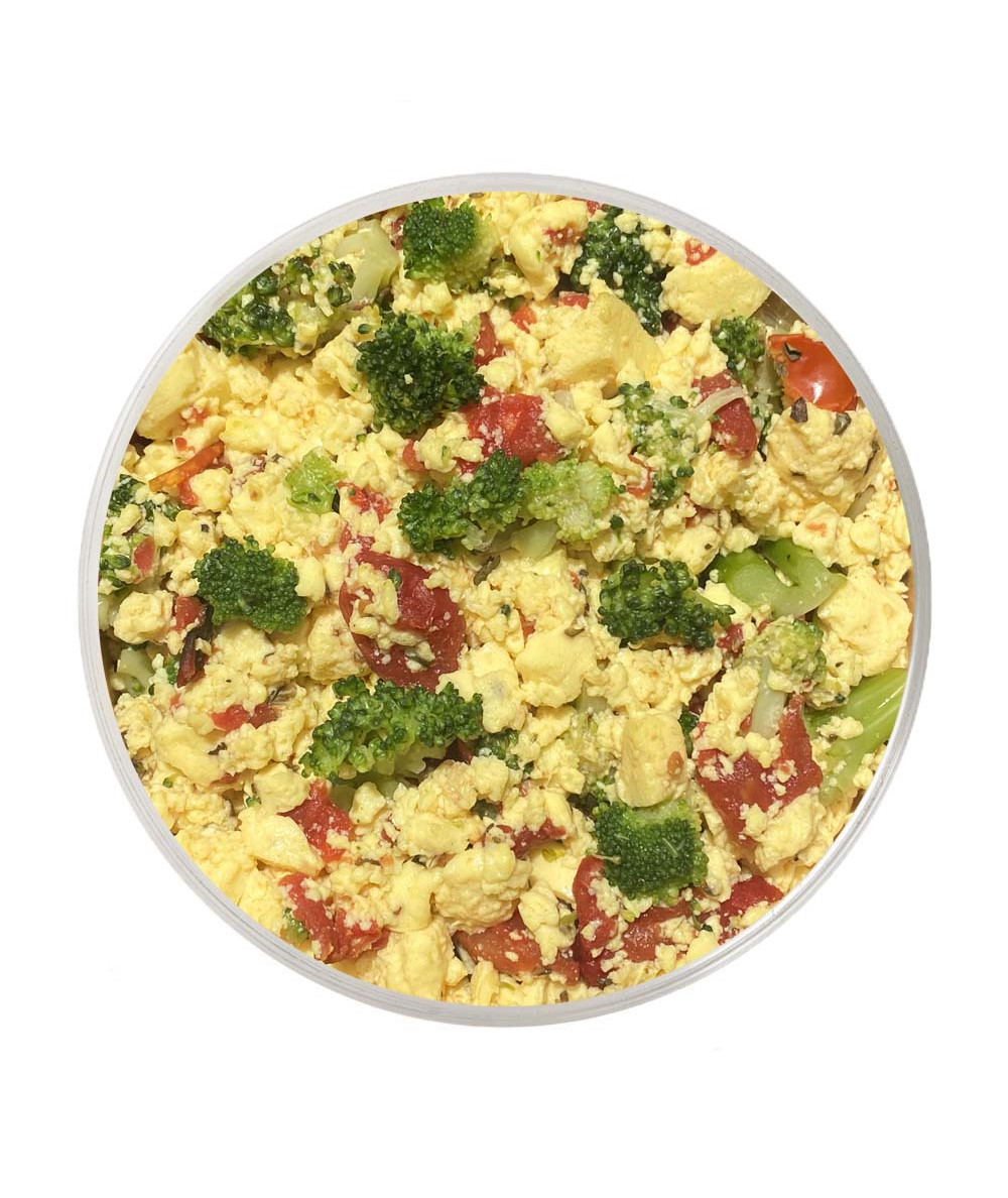 Scrambled eggs with broccoli, tomato and spinach